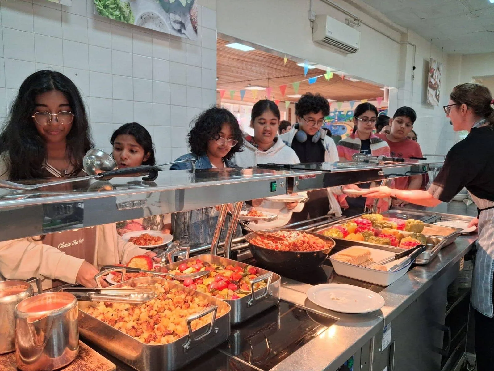 GoldenBee students at the dining hall buffet during the UK immersion programme