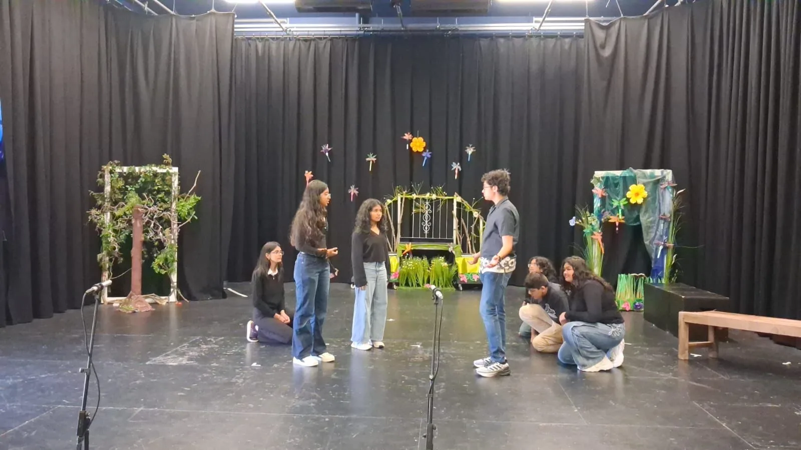 GoldenBee students performing a drama piece on stage during the UK immersion programme